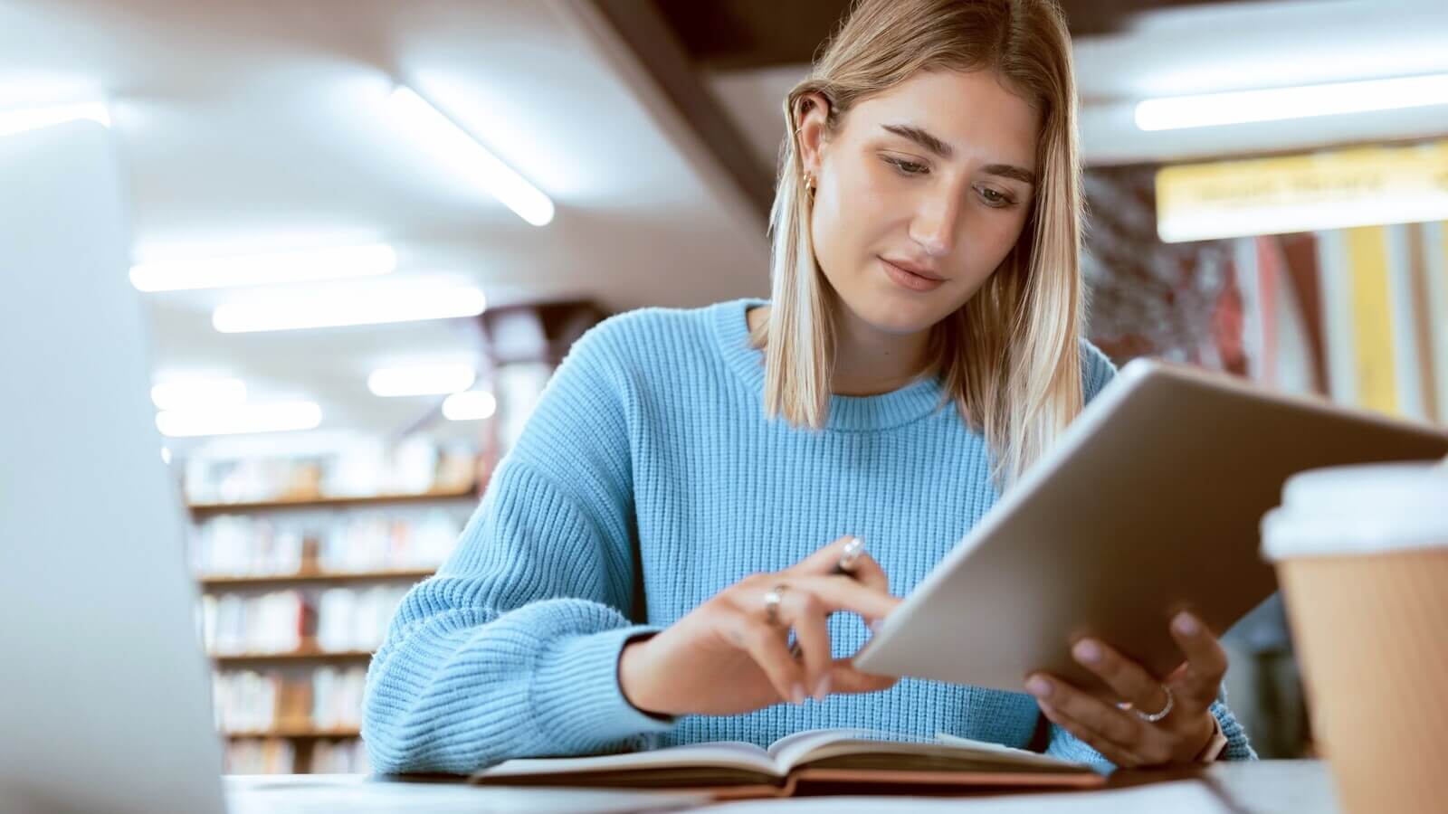 College student works on iPad
