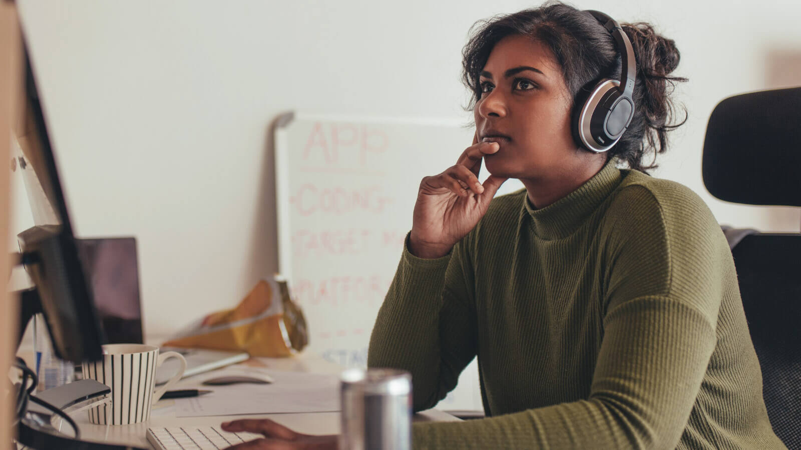 a student looks at her laptop for college majors