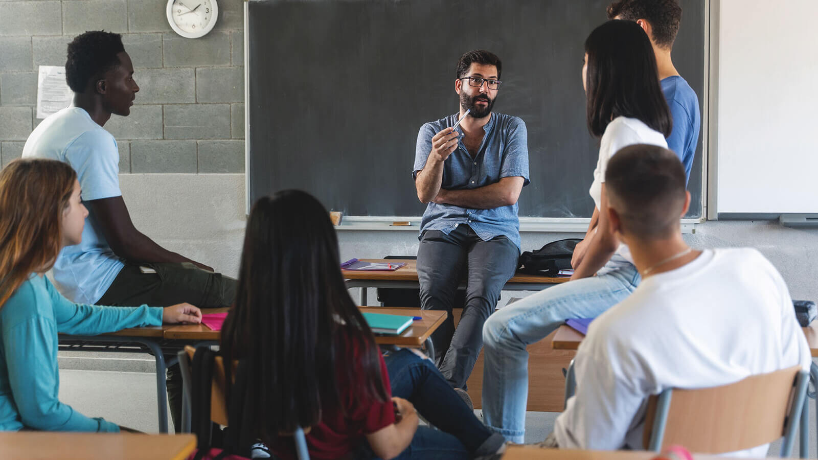 College students around the blackboard