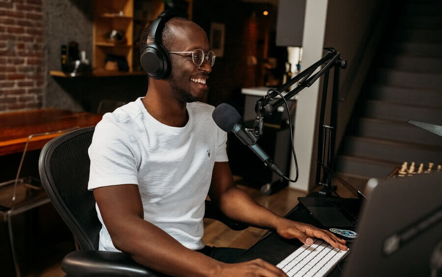 a man hosts a radio show