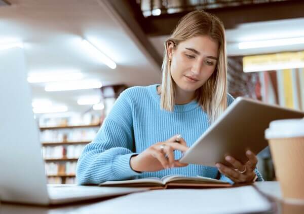 College student works on iPad