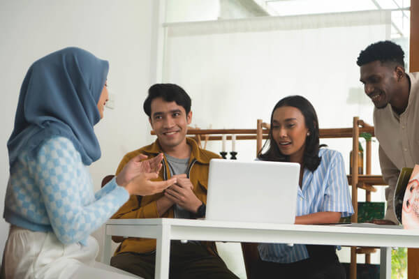 a group of students practice interviewing