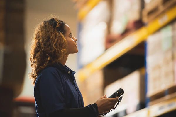 an employees pulls items from a warehouse 