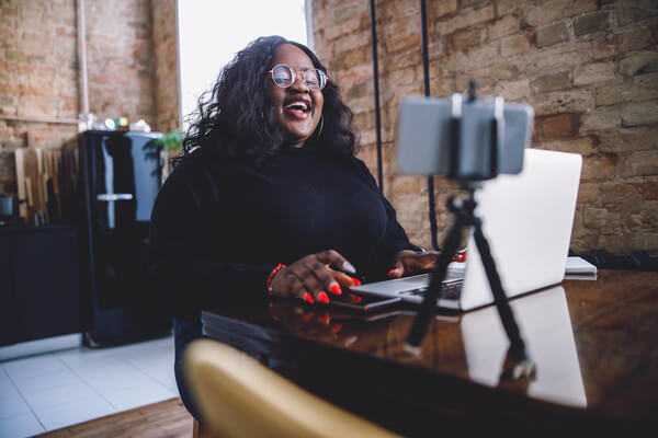 a student has a zoom call with her family back home