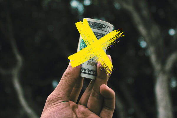 rolled up money with an X over it to signify not needing to pay for college. 