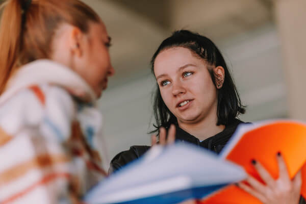 students having a discussion during a tutoring session