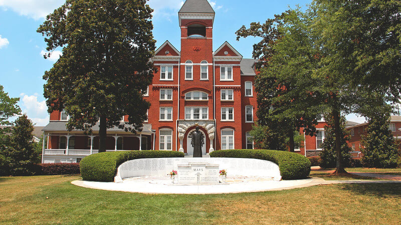 An image of a red building on the Morehouse College campus.