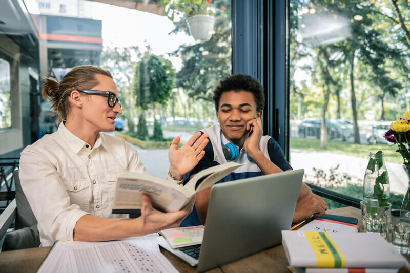 A student job shadows an employee