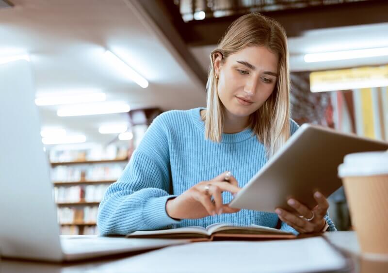 College student works on iPad