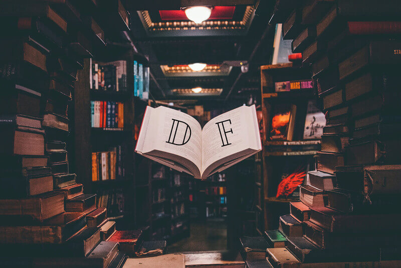 A circular book shelf with a suspended open book displaying the letters D and F.