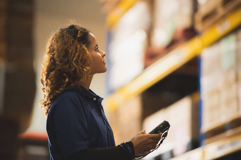 an employees pulls items from a warehouse 