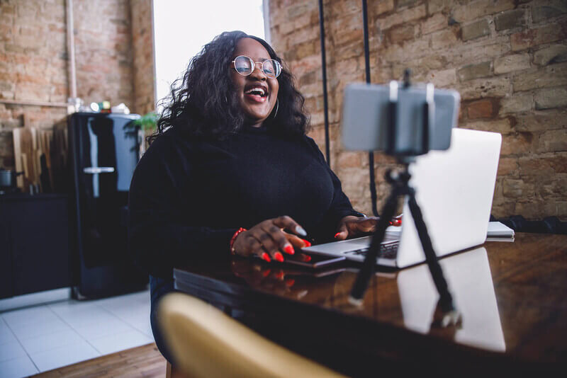 a student has a zoom call with her family back home