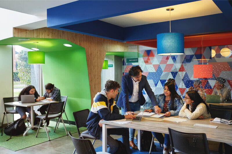 student work in a group at a campus study hall