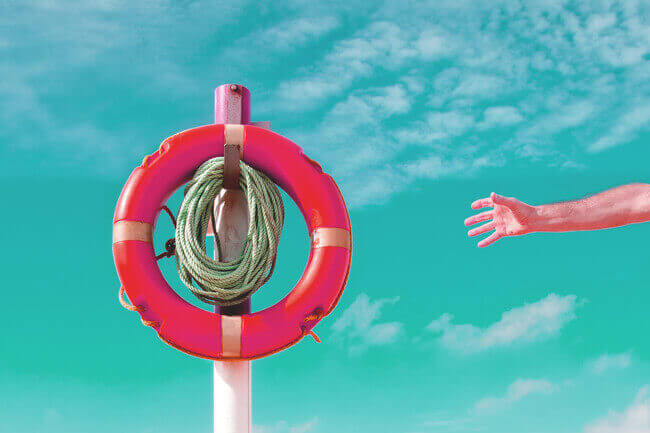 a hand reaches for a inflatable floatie